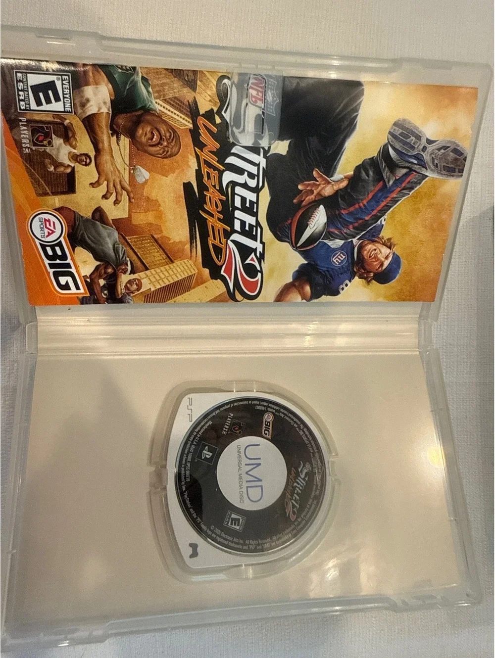 PSP Game Bundle - NFL Street 2 Unleashed, Metal Gear Solid Portable Ops Plus, &